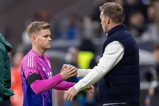 Germany Netherlands, test match Germany coach Julian Nagelsmann Germany changes the scorer to 1 1 Maximilian Mittelstädt Germany, 18 shakes hands with his coach as he leaves the pitch International soccer match between Germany and the Netherlands on March 26, 2024 at Deutsche Bank Park in Frankfurt am Main , Frankfurt am Main Hessen Germany Deutsche Bank Park