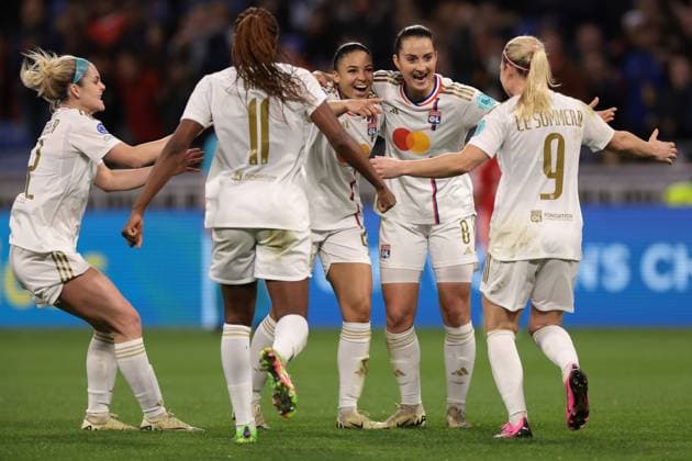 Lyon, France, 27th March 2024. Delphine Cascarino of Lyon celebrates with team mates after scoring to give the side a 1-0 lead during the UEFA Womens Champions League match at OL Stadium, Lyon. Picture credit should read: Jonathan Moscrop Sportimage EDITORIAL USE ONLY. No use with unauthorised audio, video, data, fixture lists, club league logos or live services. Online in-match use limited to 120 images, no video emulation. No use in betting, games or single club league player publications. SPI-3032-0013
