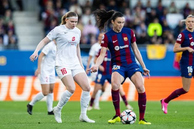 240328 Signe Gaupset of Brann and Ingrid Syrstad Engen of Barcelona during the UEFA Women s Champions League quarterfinal soccer match between Barcelona and Brann on March 28, 2024 in Barcelona Photo Vegard Grott BILDBYRAN kod VG VG0589 bbeng champions league mesterligaen dam football fotball fotboll fotboll soccer barcelona barca brann kvartfinale quarter final tfk women s champions league  Copyright: VEGARDxGRoTT BB240328VG017