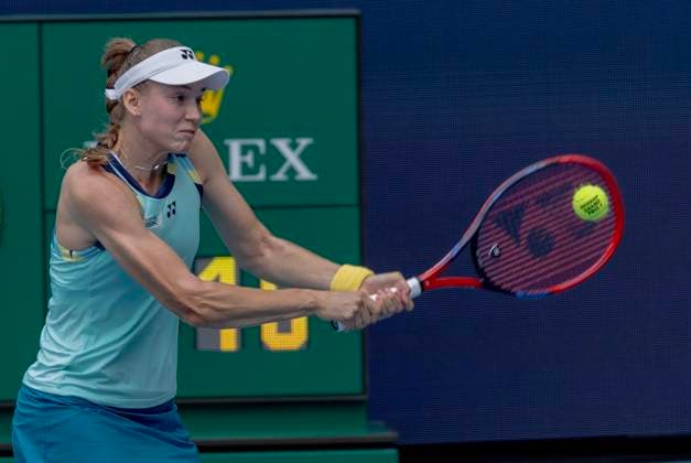 Elena Rybakina from Kazakhstan hits a backhand shot to Victoria Azarenka during the Miami Open woman s semifinals at the Hard Rock Stadium in Miami Gardens, Florida on Thursday, March 28, 2024. Rybakina defeated Azarenka 6-4, 0-6, 7-6 (tiebreaker) to advance to the women s finals. Photos By Gary I Rothstein UPI  MIA20240328114 GaryxIxRothstein