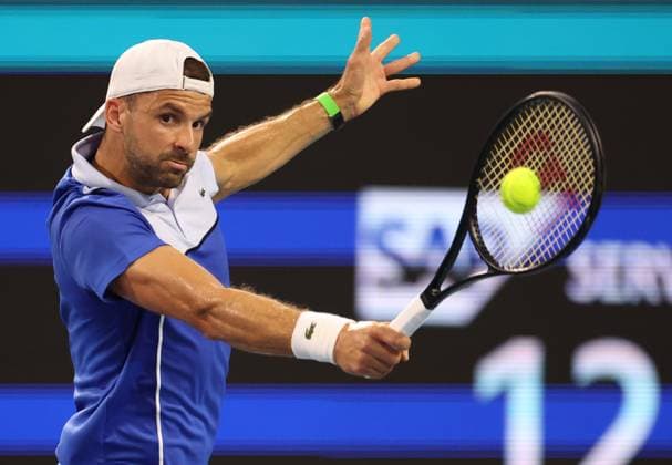 March 28, 2024, Miami Gardens, Florida, United States Of America: MIAMI GARDENS, FLORIDA - MARCH 28: Grigor Dimitrov of Bulgaria defeats Carlos Alcaraz of Spain during their match on Day 13 of the Miami Open at Hard Rock Stadium on March 28, 2024 in Miami Gardens, Florida....People: Grigor Dimitrov Miami Gardens United States Of America - ZUMAs214 20240328_ada_s214_091 Copyright: xSMGx