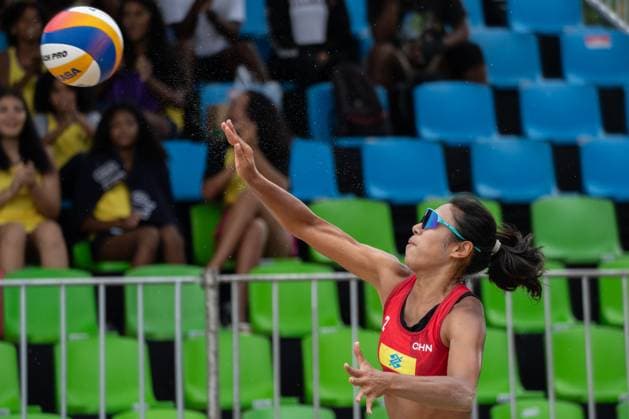 (240329) -- SAQUAREMA, March 29, 2024 -- Zhu Lingdi of China serves during the women s Preliminary Phase of Qualification between Cao Shuting Zhu Lingdi of China and Natasha Giulia of Brazil at the World Beach volleyball, Beachvolleyball Pro Tour Challenge 2024 in Saquarema, Brazil, March 28, 2024. ) (SP)BRAZIL-SAQUAREMA-BEACH VOLLEYBALL-WORLD PRO TOUR CHALLENGE 2024 WangxTiancong 