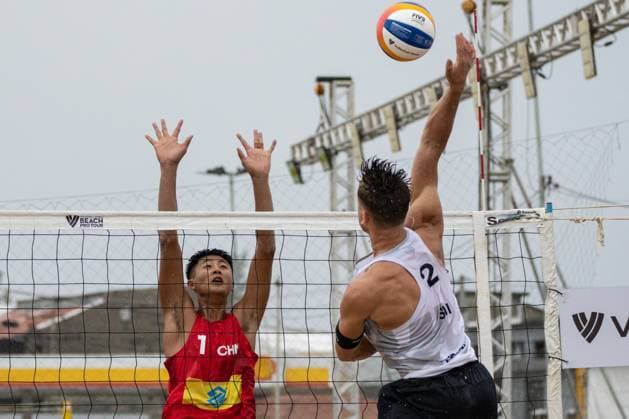 (240329) -- SAQUAREMA, March 29, 2024 -- Wang Yanwei (L) of China blocks during the men s Preliminary Phase of Qualification between Wang Yanwei Li Jie of China and Marco Krattiger Florian Breer of Switzerland at the World Beach volleyball, Beachvolleyball Pro Tour Challenge 2024 in Saquarema, Brazil, March 28, 2024. ) (SP)BRAZIL-SAQUAREMA-BEACH VOLLEYBALL-WORLD PRO TOUR CHALLENGE 2024 WangxTiancong 