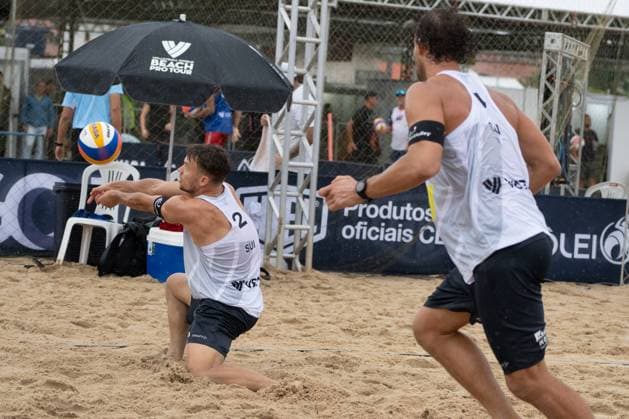 (240329) -- SAQUAREMA, March 29, 2024 -- Marco Krattiger Florian Breer (L) of Switzerland compete during the men s Preliminary Phase of Qualification between Wang Yanwei Li Jie of China and Marco Krattiger Florian Breer of Switzerland at the World Beach volleyball, Beachvolleyball Pro Tour Challenge 2024 in Saquarema, Brazil, March 28, 2024. ) (SP)BRAZIL-SAQUAREMA-BEACH VOLLEYBALL-WORLD PRO TOUR CHALLENGE 2024 WangxTiancong 