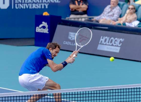 Daniil Medvedev hits a backhand shot to Jannik Sinner from Italy during the Miami Open men s semifinals at the Hard Rock Stadium in Miami Gardens, Florida on Friday, March 29, 2024. Sinner defeated Medvedev 6-1,6-2 to advance to the men s finial. Photos By Gary I Rothstein UPI  MIA20240329109 GaryxIxRothstein