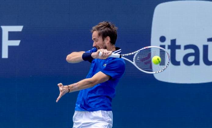 Daniil Medvedev hits a forehand shot to Jannik Sinner from Italy during the Miami Open men s.semifinals at the Hard Rock Stadium in Miami Gardens, Florida on Friday, March 29, 2024. Photos By Gary I Rothstein UPI  MIA20240329114 GaryxIxRothstein