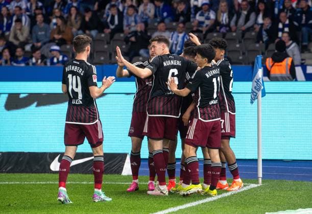 Soccer, Men, Season 2023 2024, 2 Bundesliga 27 Matchday , Hertha BSC 1 FC Nürnberg, f l Benjamin Goller 1 FC Nürnberg , Florian Flick 1 FC Nürnberg , Can Uzun 1 FC Nürnberg , Kanji Okunuki 1 FC Nürnberg , Nathaniel Brown 1 FC Nürnberg , Cheering after goal to 0 1, 30 03 2024, Copyright: xSebastianxRäppold MatthiasxKochx