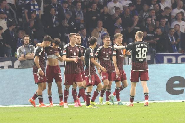 DEU, DFL, 2 FBL, Hertha BSC vs 1 FC Nuernberg, 30 03 2024, Berliner Olympiastadion, Berlin, DEU, DFL, 2 FBL, Hertha BSC vs 1 FC Nuernberg, im Bild nach dem 0 1, Nürnberger Spielerkreis DFL regulations prohibit any use of Photographs as image sequences and or quasi video Foto Juergen Engler nordphoto GmbH nordphotoxGmbHx xEngler nph00076
