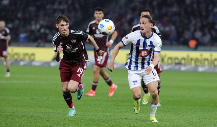Benjamin Goller, Michal Karbownik duel match scene action sport soccer soccer DFL 2 Bundesliga Men 27 Matchday Season 2023 2024 30 03 2024 Hertha BSC Berlin vs 1 FC Nürnberg FCN DFL regulations prohibit any use of photographs as image sequences and or quasi video