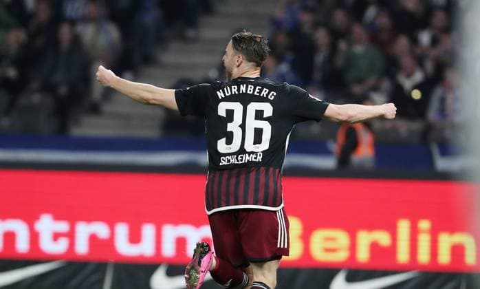 Lukas Schleimer cheers after 0 2 joy emotion jubilation Sport Football Soccer DFL 2 Bundesliga Men 27 Matchday Season 2023 2024 30 03 2024 Hertha BSC Berlin vs 1 FC Nürnberg FCN DFL regulations prohibit any use of photographs as image sequences and or quasi video