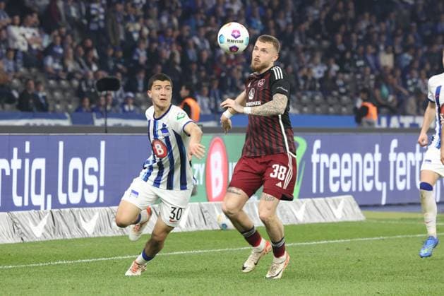 DEU, DFL, 2 FBL, Hertha BSC vs 1 FC Nuernberg, 30 03 2024, Berliner Olympiastadion, Berlin, DEU, DFL, 2 FBL, Hertha BSC vs 1 FC Nuernberg, im Bild Ibrahim Maza Hertha BSC Berlin 30 , Jannes Horn 1 FC Nuernberg 38 DFL regulations prohibit any use of Photographs as image sequences and or quasi video Foto Juergen Engler nordphoto GmbH nordphotoxGmbHx xEngler nph00076