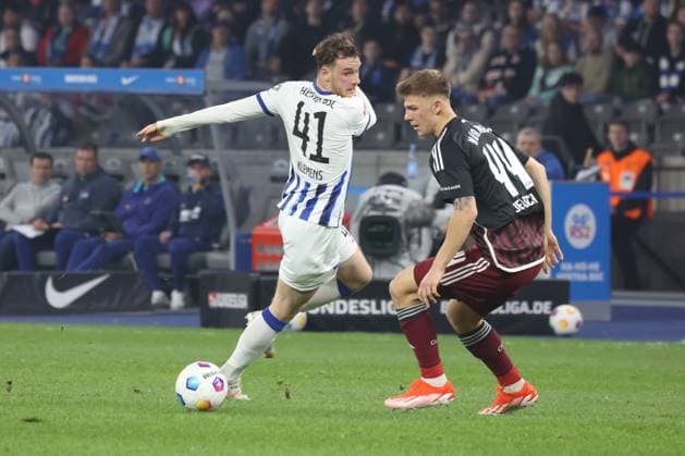 DEU, DFL, 2 FBL, Hertha BSC vs 1 FC Nuernberg, 30 03 2024, Berliner Olympiastadion, Berlin, DEU, DFL, 2 FBL, Hertha BSC vs 1 FC Nuernberg, im Bild Pascal Klemens Hertha BSC Berlin 41 , Finn Jeltsch 1 FC Nuernberg 44 DFL regulations prohibit any use of Photographs as image sequences and or quasi video Foto Juergen Engler nordphoto GmbH nordphotoxGmbHx xEngler nph00076