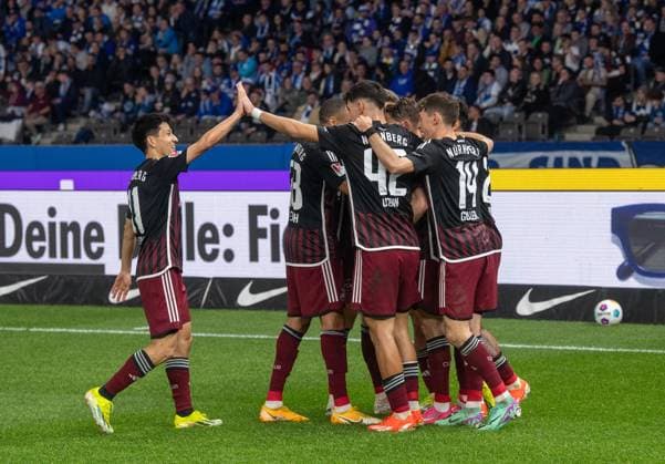 Football, Men, Season 2023 2024, 2 Bundesliga 27 Matchday , Hertha BSC 1 FC Nürnberg, v l Kanji Okunuki 1 FC Nürnberg , Jan Gyamerah 1 FC Nürnberg , Can Uzun 1 FC Nürnberg , Lukas Schleimer 1 FC Nürnberg , Benjamin Goller 1 FC Nürnberg , Celebration after goal to 0 2, 30 03 2024, Copyright: xSebastianxRäppold MatthiasxKochx