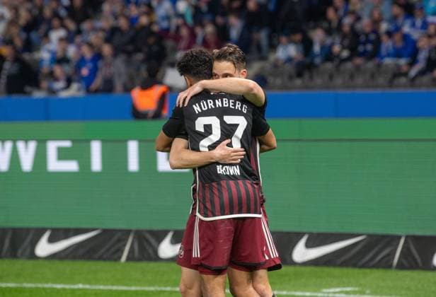 Soccer, Men, Season 2023 2024, 2 Bundesliga 27 Matchday , Hertha BSC 1 FC Nuremberg, f l Nathaniel Brown 1 FC Nuremberg , Lukas Schleimer 1 FC Nuremberg , Cheering after goal to 0 2, 30 03 2024, Copyright: xSebastianxRäppold MatthiasxKochx