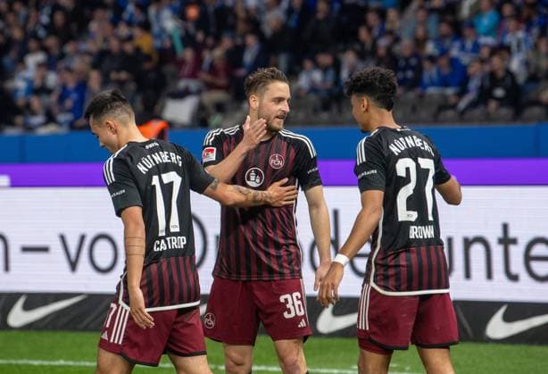 Soccer, Men, Season 2023 2024, 2 Bundesliga 27 Matchday , Hertha BSC 1 FC Nürnberg, f l Jens Castrop 1 FC Nürnberg , Lukas Schleimer 1 FC Nürnberg , Nathaniel Brown 1 FC Nürnberg , Cheering after goal to 0 2, 30 03 2024, Copyright: xSebastianxRäppold MatthiasxKochx