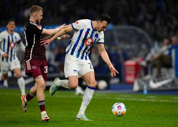 Germany, Berlin, 30 03 2024, Olympic Stadium, Hertha BSC vs 1 FC Nürnberg 2 Bundesliga, Haris Tabakovic Hertha Berlin and Jannes Horn 1 FC Nürnberg battle for the ball Berlin Olympic Stadium Berlin Germany eu-images-659