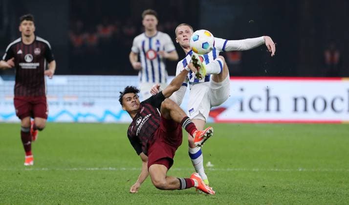 Nathaniel Brown, Marton Dardai duel match scene Action Sport Football Soccer DFL 2 Bundesliga Men 27 Matchday Season 2023 2024 30 03 2024 Hertha BSC Berlin vs 1 FC Nürnberg FCN DFL regulations prohibit any use of photographs as image sequences and or quasi video