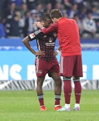 30 03 2024 Soccer Season 2023 2024 2 Soccer Bundesliga 27 Matchday Hertha BSC Berlin HBSC 1 FC Nürnberg FCN Club Sportfoto Zink DaMa xdaxmax DFL regulations prohibit any use of photographs as image sequences and or quasi video only for editorial use Joseph Hungbo 23, 1 FC Nürnberg FCN disappointed Disappointment after the end of the match is built up by Enrico Valentini 22, 1 FC Nürnberg FCN