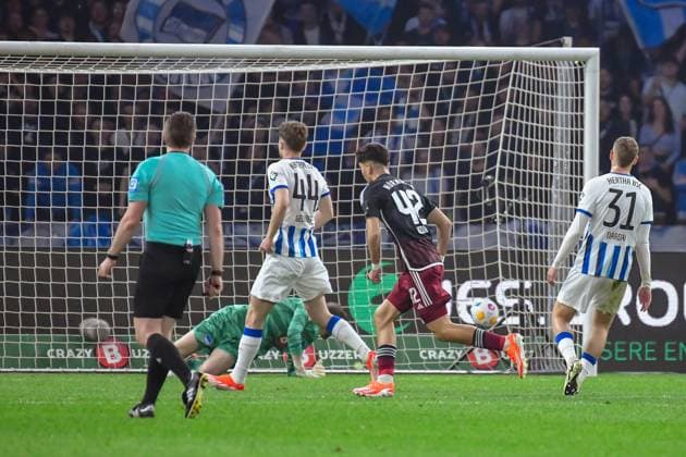 30 03 2024, xlakx, Fußball 2 Bundesliga, Hertha BSC 1 FC Nuernberg emspor, v l Linus Gechter Hertha BSC 44 ,Can Yilmaz Uzun 1 FC Nuenberg 42 ,Jubel nach dem 0 1 DFL DFB REGULATIONS PROHIBIT ANY USE OF PHOTOGRAPHS as IMAGE SEQUENCES and or QUASI VIDEO Berlin