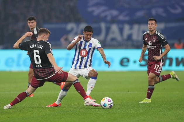 30 03 2024, xtgx, Football 2 Bundesliga, Hertha BSC Berlin 1 FC Nuernberg emspor, v l Florian Flick Nuernberg, 6 , Jeremy Dudziak Hertha, 19 duel, duel, fight, tackle DFL DFB REGULATIONS PROHIBIT ANY USE OF PHOTOGRAPHS as IMAGE SEQUENCES and or QUASI VIDEO Berlin