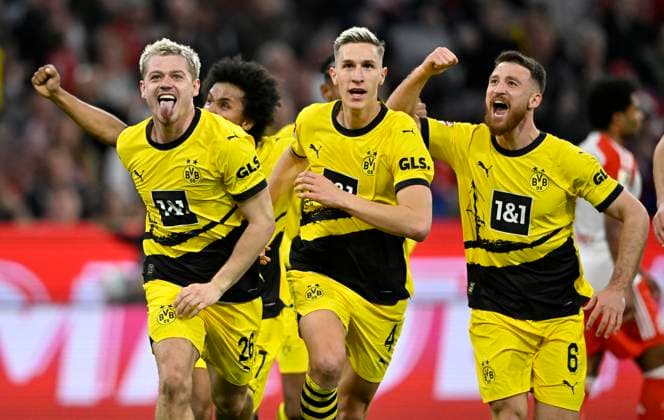 Bilder des Jahres 2024, Sport 03 März Sport Themen der Woche KW13 Sport Bilder des Tages TOR zum 0:2 Julian Ryerson Borussia Dortmund BVB (26) Torjubel Salih Oezcan Borussia Dortmund BVB (06) Nico Schlotterbeck Borussia Dortmund BVB (04) FC Bayern Muenchen FCB vs Borussia Dortmund BVB 30.03.2024 DFL REGULATIONS PROHIBIT ANY USE OF PHOTOGRAPHS AS IMAGE SEQUENCES AND OR QUASI-VIDEO FC Bayern Muenchen FCB vs Borussia Dortmund BVB *** GOAL at 0 2 Julian Ryerson Borussia Dortmund BVB 26 Goal celebration Salih Oezcan Borussia Dortmund BVB 06 Nico Schlotterbeck Borussia Dortmund BVB 04 FC Bayern Muenchen FCB vs Borussia Dortmund BVB 30 03 2024 DFL REGULATIONS PROHIBIT ANY USE OF PHOTOGRAPHS AS IMAGE SEQUENCES AND OR QUASI VIDEO FC Bayern Muenchen FCB vs Borussia Dortmund BVB