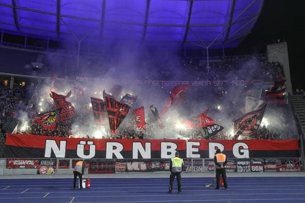 30 03 2024, xtgx, Football 2 Bundesliga, Hertha BSC Berlin 1 FC Nuremberg emspor, v l symbol photo, symbol image, fans of Nuremberg send pyro, pyrotechnics DFL DFB REGULATIONS PROHIBIT ANY USE OF PHOTOGRAPHS as IMAGE SEQUENCES and or QUASI VIDEO Berlin