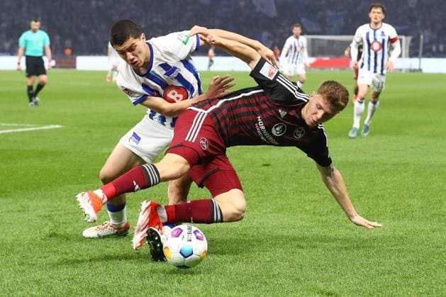 30 03 2024, xtgx, Soccer 2 Bundesliga, Hertha BSC Berlin 1 FC Nuernberg emspor, v l Ibrahim Maza Hertha, 30 , Finn Jeltsch Nuernberg, 44 duel, duel, fight, tackle DFL DFB REGULATIONS PROHIBIT ANY USE OF PHOTOGRAPHS as IMAGE SEQUENCES and or QUASI VIDEO Berlin
