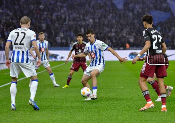 Soccer 2 Bundesliga, Hertha BSC 1 FC Nuernberg 30 03 2024, xdanx, Soccer 2 Bundesliga, Hertha BSC 1 FC Nuernberg, v l Marten Winkler Hertha BSC 22 ,Ibrahim Maza Hertha BSC 30 on the ball,Nathaniel Brown 1 FC Nuenberg 27 DFL DFB REGULATIONS PROHIBIT ANY USE OF PHOTOGRAPHS as IMAGE SEQUENCES and or QUASI VIDEO Foto Daniel Lakomski Mix1 Berlin Olympiastadion Berlin Berlin Germany EN Copyright: xDanielxLakomskix