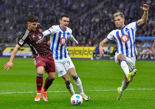 Soccer 2 Bundesliga, Hertha BSC 1 FC Nuernberg 30 03 2024, xdanx, Soccer 2 Bundesliga, Hertha BSC 1 FC Nuernberg, v l Taylan Duman 1 FC Nuenberg 8 ,Smail Prevljak Hertha BSC 9 ,Florian Niederlechner Hertha BSC 7 ,duel, duel, fight, tackle DFL DFB REGULATIONS PROHIBIT ANY USE OF PHOTOGRAPHS as IMAGE SEQUENCES and or QUASI VIDEO Photo Daniel Lakomski Mix1 Berlin Olympiastadion Berlin Berlin Germany EN Copyright: xDanielxLakomskix