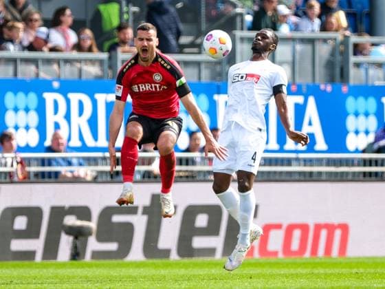 Ivan Prtajin SV Wehen Wiesbaden, 18 in duel with Maxwell Gyamfi VfL Osnabrueck, 04 , GER, SV Wehen Wiesbaden vs VfL Osnabrueck, Soccer, 2 Bundesliga, Matchday 27, Season 2023 2024, 31 03 2024 DFL REGULATES PROHIBIT ANY USE OF PHOTOGRAPHS AS IMAGE SEQUENCES AND OR QUASI VIDEO GER, SV Wehen Wiesbaden vs VfL Osnabrueck, Football, 2 Bundesliga, Matchday 27, Season 2023 2024, 31 03 2024 Wiesbaden Copyright: xEibner-Pressefoto FlorianxWieganx EP_FWD