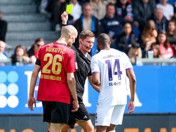 yellow card for Aleksandar Vukotic SV Wehen Wiesbaden, 26 and Oumar Diakhite VfL Osnabrueck, 14 , GER, SV Wehen Wiesbaden vs VfL Osnabrueck, Football, 2 Bundesliga, Matchday 27, Season 2023 2024, 31 03 2024 DFL REGULATES PROHIBIT ANY USE OF PHOTOGRAPHS AS IMAGE SEQUENCES AND OR QUASI VIDEO GER, SV Wehen Wiesbaden vs VfL Osnabrueck, Football, 2 Bundesliga, Matchday 27, Season 2023 2024, 31 03 2024 Wiesbaden Copyright: xEibner-Pressefoto FlorianxWieganx EP_FWD