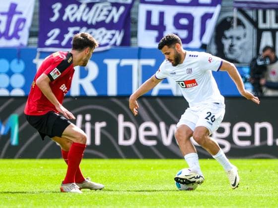 Gino Fechner SV Wehen Wiesbaden, 6 in duel with Dave Gnaase VfL Osnabrueck, 26 , GER, SV Wehen Wiesbaden vs VfL Osnabrueck, Soccer, 2 Bundesliga, Matchday 27, Season 2023 2024, 31 03 2024 DFL REGULATES PROHIBIT ANY USE OF PHOTOGRAPHS AS IMAGE SEQUENCES AND OR QUASI VIDEO GER, SV Wehen Wiesbaden vs VfL Osnabrueck, Football, 2 Bundesliga, Matchday 27, Season 2023 2024, 31 03 2024 Wiesbaden Copyright: xEibner-Pressefoto FlorianxWieganx EP_FWD