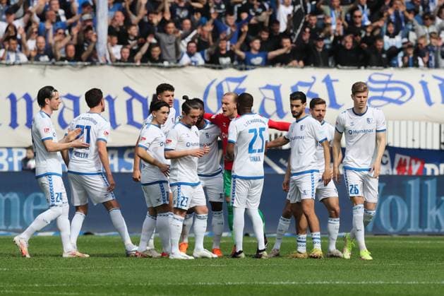 Goalkeeper Dominik Reimann M ,1 FC Magdeburg,1 with f l Jean Hugonet 1 FC Magdeburg,24 , Tobias Müller 1 FC Magdeburg,21 , Jason Ceka 1 FC Magdeburg,10 , Daniel Elfadli 1 FC Magdeburg,6 , Baris Atik 1 FC Magdeburg,23 , Silas Gnaka 1 FC Magdeburg,25 , Mohammed El Hankouri 1 FC Magdeburg,11 , Alexander Nollenberger 1 FC Magdeburg,17 , Luca Schuler 1 FC Magdeburg,26 2 Soccer Bundesliga Season 2023 2024 1 FC Magdeburg vs Hannover 96 at the MDCC Arena in Magdeburg Crop,single image,action,soccer,man,men,Germany,31 03 2024
