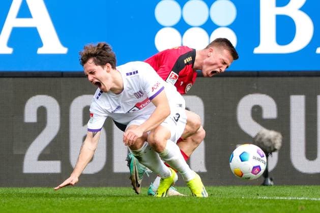 Florian Kleinhansl VfL Osnabrueck, 03 in duel with Franko Kovacevic SV Wehen Wiesbaden, 14 , GER, SV Wehen Wiesbaden vs VfL Osnabrueck, Soccer, 2 Bundesliga, Matchday 27, Season 2023 2024, 31 03 2024 DFL REGULATES PROHIBIT ANY USE OF PHOTOGRAPHS AS IMAGE SEQUENCES AND OR QUASI VIDEO GER, SV Wehen Wiesbaden vs VfL Osnabrueck, Football, 2 Bundesliga, Matchday 27, Season 2023 2024, 31 03 2024 Wiesbaden Copyright: xEibner-Pressefoto FlorianxWieganx EP_FWD