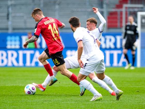 Franko Kovacevic SV Wehen Wiesbaden, 14 in duel with Michael Bruno Dominique Cuisance VfL Osnabrueck, 27 , GER, SV Wehen Wiesbaden vs VfL Osnabrueck, Soccer, 2 Bundesliga, Matchday 27, Season 2023 2024, 31 03 2024 DFL REGULATES PROHIBIT ANY USE OF PHOTOGRAPHS AS IMAGE SEQUENCES AND OR QUASI VIDEO GER, SV Wehen Wiesbaden vs VfL Osnabrueck, Football, 2 Bundesliga, Matchday 27, Season 2023 2024, 31 03 2024 Wiesbaden Copyright: xEibner-Pressefoto FlorianxWieganx EP_FWD