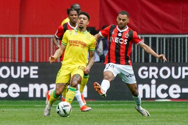 Soares Gomes Douglas Augusto (FC Nantes) - Alexis Claude Maurice (OGC Nice) FOOTBALL : OGC Nice vs FC Nantes- Ligue 1 Uber Eats - Nice - 31 03 2024 NorbertScanella Panoramic 