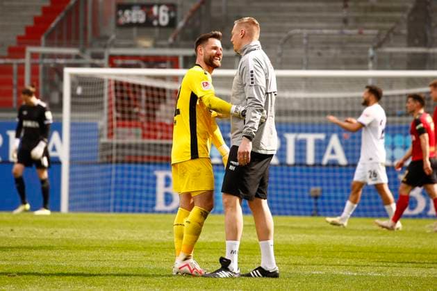 31 03 2024, xavx, Soccer 2 Bundesliga, SV Wehen Wiesbaden VfL Osnabrück emspor, v l Goalkeeper Philipp Kühn VfL Osnabrück cheers after the end of the match DFL DFB REGULATIONS PROHIBIT ANY USE OF PHOTOGRAPHS as IMAGE SEQUENCES and or QUASI VIDEO Wiesbaden