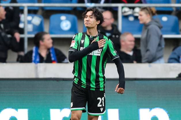 Goal celebration goal scorer Sei Muroya Hannover 96,21 scores to 0 2 2 Soccer Bundesliga season 2023 2024 1 FC Magdeburg vs Hannover 96 at the MDCC Arena in Magdeburg single picture,action,soccer,man,men,Germany,31 03 2024
