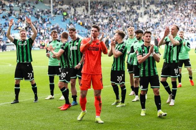 Goalkeeper Ron Robert Zieler Hannover 96,1 celebrates with the team of Hannover 96 after the match in front of the fan block 2 Soccer Bundesliga season 2023 2024 1 FC Magdeburg vs Hannover 96 at the MDCC Arena in Magdeburg action,soccer,man,men,Germany,31 03 2024