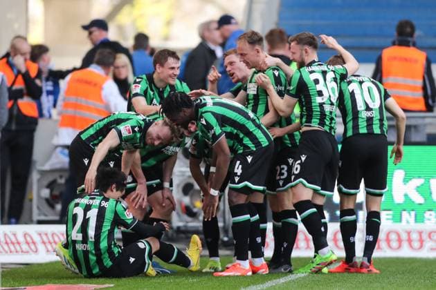 Goalscorer Sei Muroya Hannover 96,21 scores to 0 2 2 Soccer Bundesliga Season 2023 2024 1 FC Magdeburg vs Hannover 96 at the MDCC Arena in Magdeburg Action,Soccer,Man,Men,Germany,31 03 2024