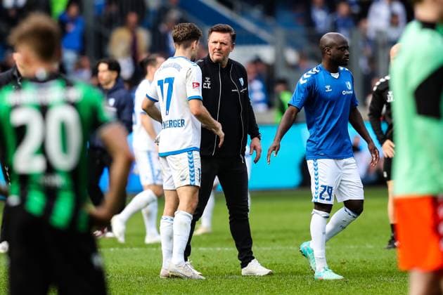 Coach Christian Titz 1 FC Magdeburg with Alexander Nollenberger 1 FC Magdeburg,17 and Amara Conde 1 FC Magdeburg,29 after the match 2 Soccer Bundesliga Season 2023 2024 1 FC Magdeburg vs Hannover 96 at the MDCC Arena in Magdeburg Action,Soccer,Man,Men,Germany,31 03 2024