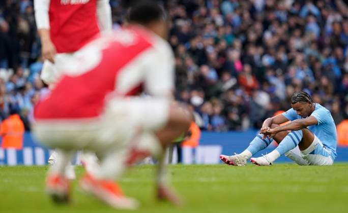 Sport Themen der Woche KW13 Sport Bilder des Tages Manchester, England, 31st March 2024. Manuel Akanji of Manchester City (R) and Gabriel of Arsenal react at the final whistle during the Premier League match at the Etihad Stadium, Manchester. Picture credit should read: Andrew Yates Sportimage EDITORIAL USE ONLY. No use with unauthorised audio, video, data, fixture lists, club league logos or live services. Online in-match use limited to 120 images, no video emulation. No use in betting, games or single club league player publications. SPI-3047-0102