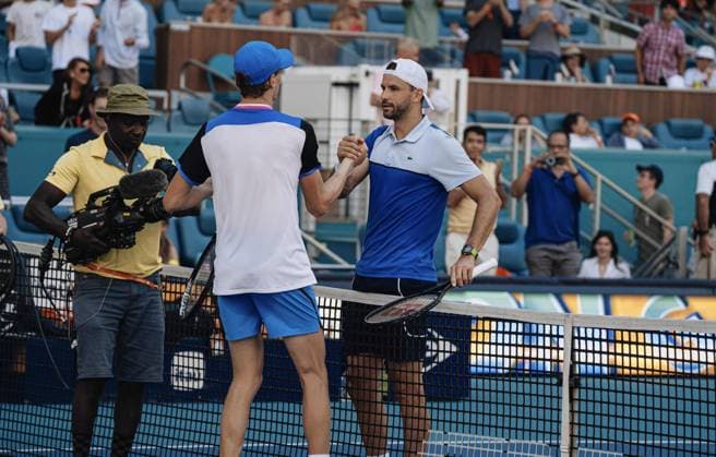 Jannik Sinner from Italy winning the 2024 Miami Open, shaking hand with Grigor Dimitrov from Bulgaria at the Hard Rock Stadium, Miami, Florida, USA TENNIS : Finale Hommes - Miami 2024 - Etats Unis - 31 03 2024 JulienNouet TENNISMAJORS 
