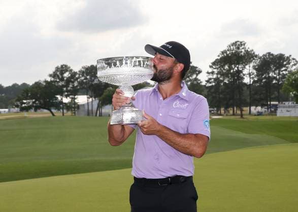 HOUSTON, TX - MARCH 31: Stephan Jaeger (GER) kisses winner™s trophy during the final round of the PGA, Golf Herren Texas Children™s Houston Open at Memorial Park Golf Course on March 31, 2024 in Houston, Texas. (Photo by Leslie Plaza Johnson Icon Sportswire) GOLF: MAR 31 PGA Texas Children s Houston Open EDITORIAL USE ONLY Icon240331134