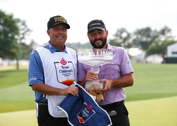 HOUSTON, TX - MARCH 31: (left to right) Caddie Henry Diana and Stephan Jaeger (GER) pose with trophy during the final round of the PGA, Golf Herren Texas Children™s Houston Open at Memorial Park Golf Course on March 31, 2024 in Houston, Texas. (Photo by Leslie Plaza Johnson Icon Sportswire) GOLF: MAR 31 PGA Texas Children s Houston Open EDITORIAL USE ONLY Icon240331137