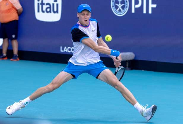 Jinnik Sinner from Italy hits a backhand shot to Grigor Dimitrov from Bulgaria in the Miami Open man s finals at the Hard Rock Stadium in Miami Gardens, Florida on Sunday, March 31, 2024. Photos By Gary I Rothstein UPI  MIA20240331121 GaryxIxRothstein