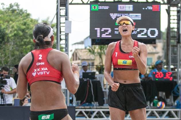 (240401) -- SAQUAREMA, April 1, 2024 -- Xue Chen (R) Xia Xinyi of China celebrate during the women s semifinal match between Xue Chen Xia Xinyi of China and Hegeile Vitoria of Brazil at the World Beach volleyball, Beachvolleyball Pro Tour Challenge 2024 in Saquarema, Brazil, March 31, 2024. (Photo by Xinhua) (SP)BRAZIL-SAQUAREMA-BEACH VOLLEYBALL-WORLD PRO TOUR CHALLENGE 2024 ClaudiaxMartini 