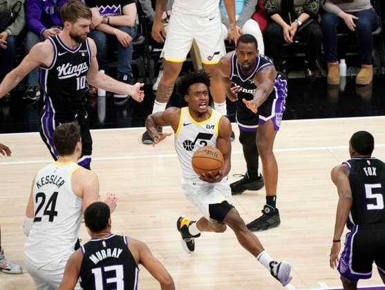 Sport Themen der Woche KW13 Sport Bilder des Tages (240401) -- SACRAMENTO, April 1, 2024 -- Collin Sexton (C) of Utah Jazz breaks through during the 2023-2024 NBA, Basketball Herren, USA regular season match between Sacramento Kings and Utah Jazz in Sacramento, the United States, March 31, 2024. (Photo by Xinhua) (SP)U.S.-SACRAMENTO-BASKETBALL-NBA-KINGS VS JAZZ LixJianguo 
