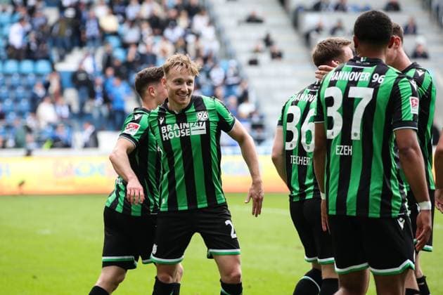 Jannik Dehm Hannover 96,20 after the goal to 0 3 by Cedric Teuchert Hannover 96,36 2 Soccer Bundesliga Season 2023 2024 1 FC Magdeburg vs Hannover 96 at the MDCC Arena in Magdeburg Action,Soccer,Man,Men,Germany,31 03 2024