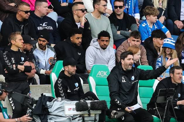 from l Luc Castaignos 1 FC Magdeburg,9 , Tarek Chahed 1 FC Magdeburg,34 , Leon Bell Bell 1 FC Magdeburg,19 , Xavier Amaechi 1 FC Magdeburg,20 , Goalkeeper Julian Pollersbeck 1 FC Magdeburg,42 , Co Coach Andreas Schumacher 1 FC Magdeburg , Co Coach Andre Kilian 1 FC Magdeburg 2 Soccer Bundesliga Season 2023 2024 1 FC Magdeburg vs Hannover 96 at the MDCC Arena in Magdeburg Soccer,Man,Men,Germany,31 03 2024